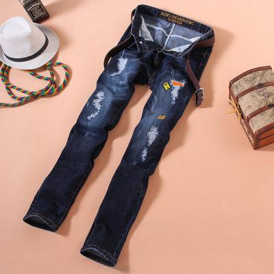 China Skinny Fit High Elastic Waisted Mens Tapered Jeans Embroideried Patches for sale