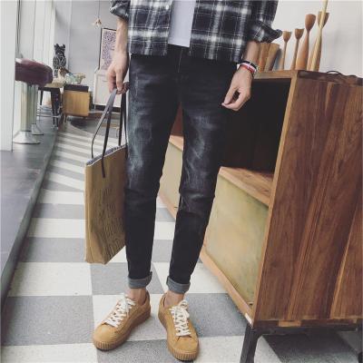 China Wrinkled Knee Hole Mens Slim Straight Jeans Grinding Wash Wear Resistant for sale