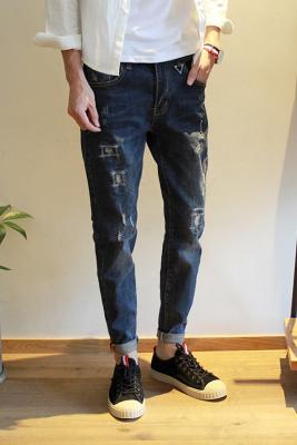 China Durable Distressed Mens Slim Straight Jeans With Patches Color Fade Proof for sale