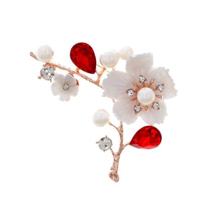 China 2021 Europe and America fashion shell plum material flower pins hot sale new customizable brooch pins for sale