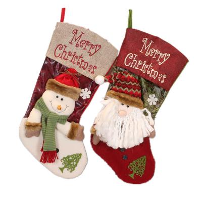 China 2021 Christmas New Year Hanging Decor Santa Claus Candy Gift Bag Xmas Canvas Tree Sock Stocking for sale