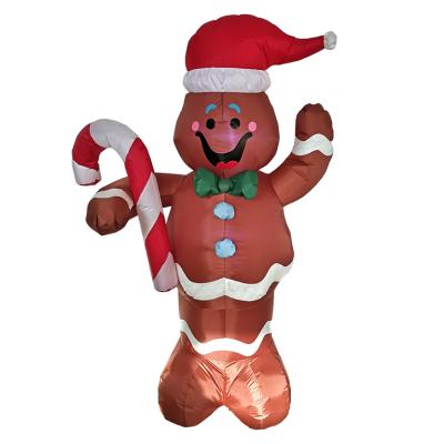 China Convenient 8ft Christmas Inflatable Gingerbread Man Carry Candy Cane with Built-in Inflatable Outdoor LED Patio Christmas Decoration for sale