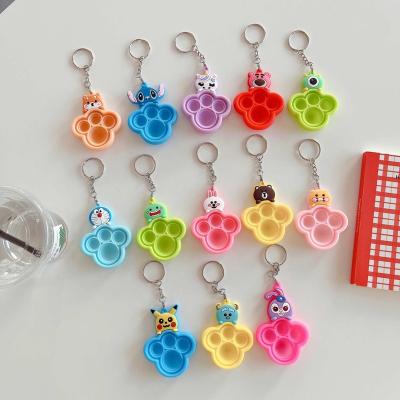 China The Sensory Ring Backpack Pendant Gift Mini Fidget Cartoon Catpaw Keychains Finger Bubble Music Key New Silicone Relaxation for sale