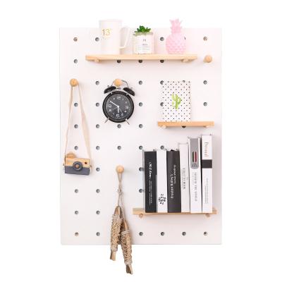 China Rustic Simple And Fashionable Multifunctional Solid Wooden Hole Board Rack Shelf for sale