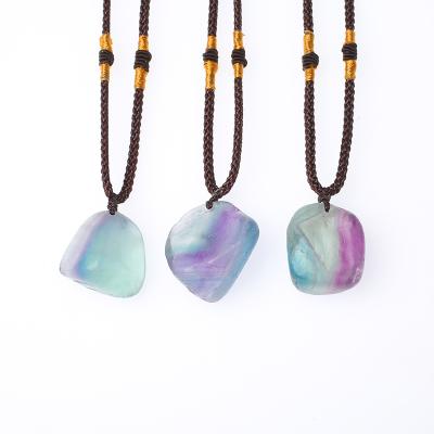 China China wholesale natural fluorite pendants rainbow fluorite crystal pendants for home decoration for sale