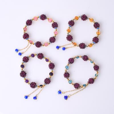 China Natural Tassel Weave Bracelet China Ball Garnet Flower Crystal Flower Ball Bracelets for sale