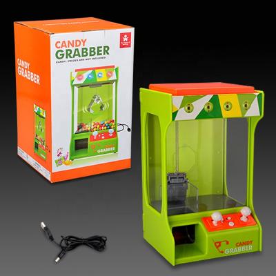 China Hot sale carryover candy toys grabber with music, candy machine, candy toy for kids GHD173981 for sale