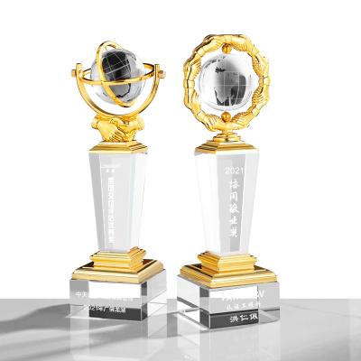 China Modern High-grade metal trophy custom handshake crystal ball Earth cooperation win-win decoration souvenir engraved trophy for sale