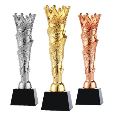 China Healthcare Institutes Custom gold creative team Champion cup crystal trophies production annual awards engraved crown resin trophy for sale