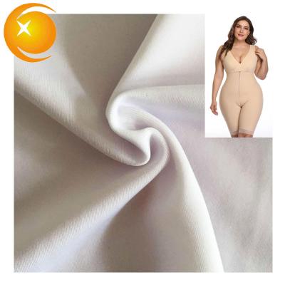 China Oilproof 80% 20% Spandex Knit Plain UV Nylon Fabric High Dust Protection Waterproof Elastic Waterproof Cloth For Shapewear Legging for sale