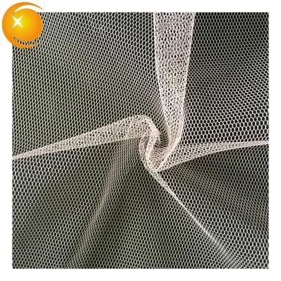 China Wrinkle Resistant 40D Polyester Mesh Veil Kids Tulle Fabric Stiff Tough White For Wedding Decoration Bride Dress Fabric for sale