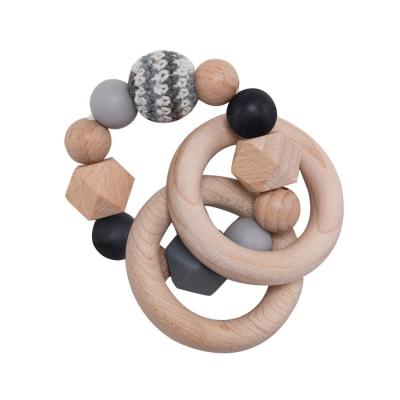 China Eco-friendly Wooden Teether Baby Care Bracelet Silicone Teether Beads Wooden Teether For Kids Growth for sale