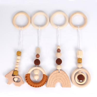 China New Design Eco-friendly DIY 4 Styles Natural Wooden Teething Beads Knitted Bracelet Teether Baby Fitness Equipment Pendant for sale