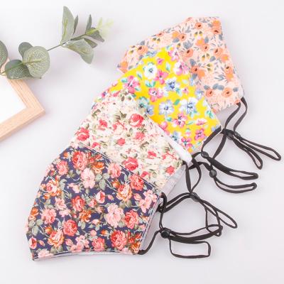 China Reusable foldable cotton facemask fabric with filter dust proof washable cotton 3 ply civil cute floral maskes wholesale for sale