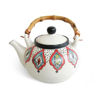 China Viable Wholesale Tea Set Flower Design Stoneware Ceramic Teapot with Bamboo Handle for Tea and Coffee for sale