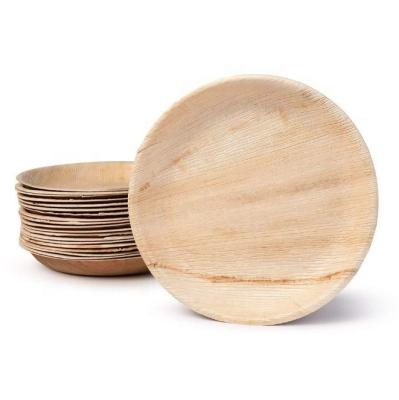 China 2021 disposable new tableware round natural palm leaf dish for wedding party disposable palm leaf dish for sale