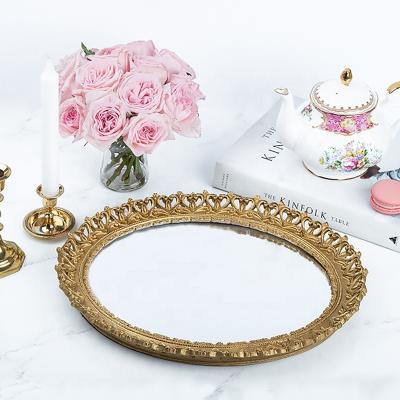 China Luxury Round Luxury Serving Tray Gold Round Luxury Vanity Resin Perfume Jewelry Cosmetic Glass Mirror Tray Centerpiece Wedding for sale