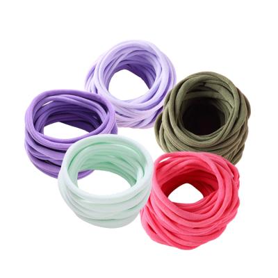 China Wholesale Durable Customized Fashion Gym Wristband Solid Color Fabric Stretchy Durable Sports Hair Ties Accessories for sale