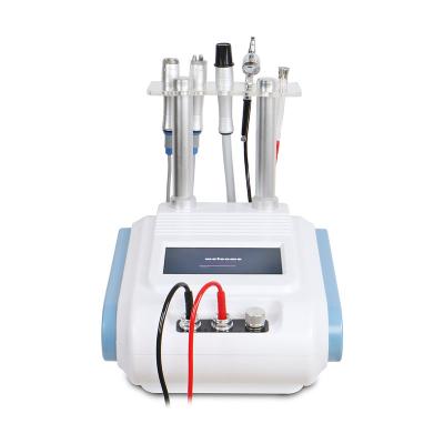 China YH-5601 Skin Rejuvenation Vacuum Spray RF Slimming Skin Rejuvenation Care Microcurrent Microdermabrasion Facial Device Beauty Machine for sale