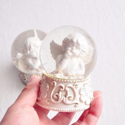 China Europe Wholesale Customized Angel Snow Globe for sale