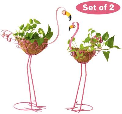 China Garden Decoration Metal Pink Flamingos Yard Ornaments With Planter for sale