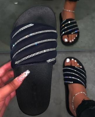 China 2021 New Crystal Luminous Flat Sandals Anti-Slippery Ladies Slippers Slides Black PVC Women Slides Summer Beach Slides Slippers for sale