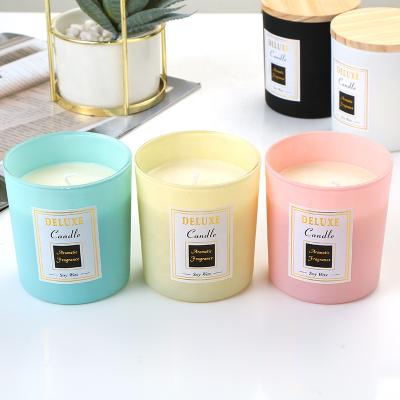 China Creative Multicolor Frosted Transparent Black White Candle Jars With Wooden Lids for sale