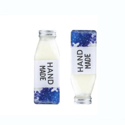 China 250ML350ML Square Milk Juice Drink Glass Bottle With Environmental Friendly Wholesale French Empty Lid for sale