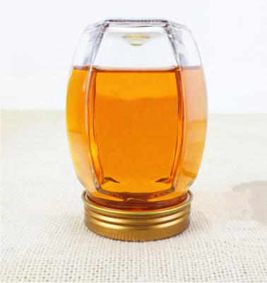 China Wholesale 380ml 730ml Food Storage Empty Clear Bottle Hexagonal Glass Honey Jar for sale