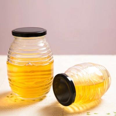 China Eco-freindly Classic 100ml 250ml 500ml 750ml Clear Glass Bottle For Honey With Lid for sale