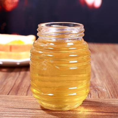 China Wholesale 100ml Honey Jar Bottle Honeycomb Shaped Glass Jar Environmental Friendly Metal Screw Cap Lid For Honey for sale