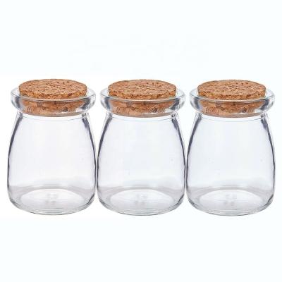 China Environmental Friendly Pudding Wedding Favors Honey Pots Milk Canister Cup Mini Yogurt Glass Jars With Plastic Screw Cover for sale