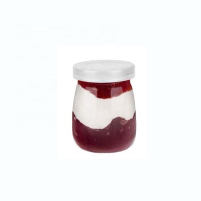 China Environmental Friendly Wholesale 100ml 200ml Mini Glass Bottles Pudding Milk Yogurt Candy Jars With Cork Lid for sale