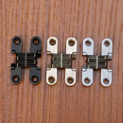 China Zinc Alloy Hidden Hinges Invisible Concealed Cross Door Hinge for sale