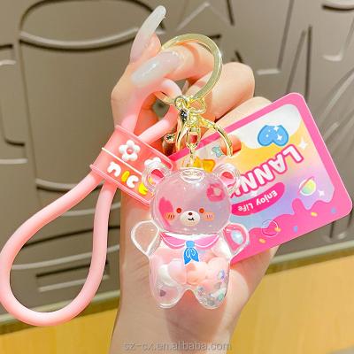 China Cute pandent and gift kawaii fashion acrylic liquid filled oil bear car keychain lanyard llaveros mini liquid bear floating key chain for sale