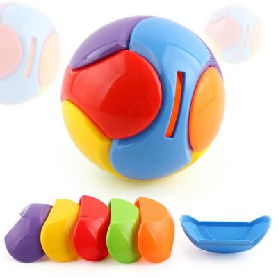 China 9.5cm Eco-friendly Material Kids Puzzle Assembly Toy Ball Building Blocks Plastic Piggy Bank Educational Toys for sale