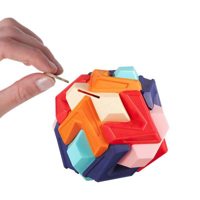 China Eco-friendly Material Saving Educational Plastic Box Ball Puzzle Set Kids Toys 11.5cm Balls Toy Money Box for sale