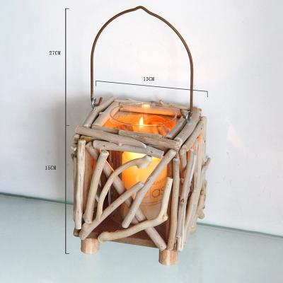 China Creative wooden portable hollow home decoration storm candle holder style restaurant and cafe pastoral decoration for sale