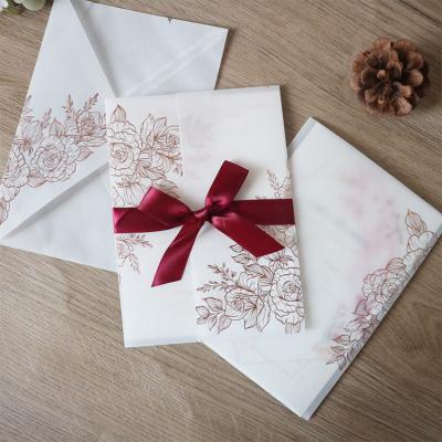 China Europe Laser Cut Elegant Luxurious Wedding Invitation Cards Gold Stamping Heat Rose With Tracing Paper Envelopes for sale