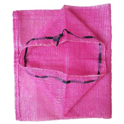 China Poly Recyclable Vegetable Net Knitted Plastic Draw String Bags For Onion Firewood for sale