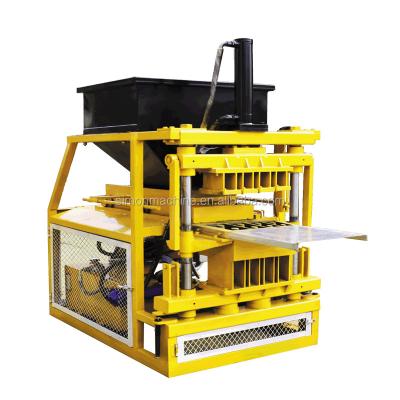 China 4 pcs one mold Interlocking Bricks Machine SHM4-10 clay paver price in Pakistan for sale