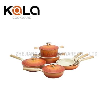 China New design sustainable non stick aluminum cookware set pots and pans pan set with wooden handle wholesale kitchen cookware set for sale