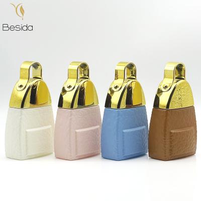 China Cosmetic Colorful 30ml Refill Travel Bag Shaped Parfum Bottle Pump Spray Cap Perfume Bottles For Perfume Bag for sale