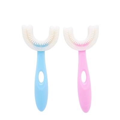 China Food Grade U Shaped Safety Silicone Toothbrush 360 Soft Strip Children Toothbrush for sale