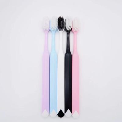 China Lightweight Macaron Color Rhombus Handle Wholesale Tooth Whitening High Quality Adult Toothbrush for sale