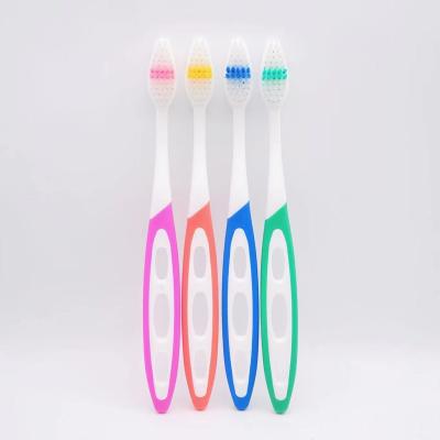 China OEM/ODM Reusable Four Pieces In One Pack Home Use Colorful Adult Toothbrush for sale