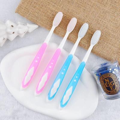 China Wholesale Tapered Bristle OEM Home Use Product Tapered PBT Bristle Oral Manual Care Toothbrush Adult Toothbrush for sale