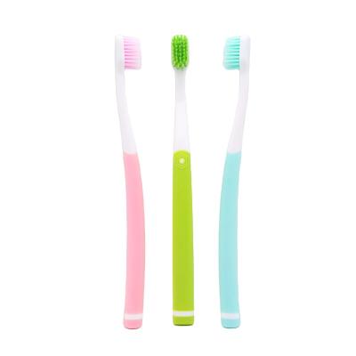 China Reusable Home use Soft bristle toothbrush Non-slip Rubber Wrapped Handle Deep Clean OEM Dental Care Toothbrush for sale