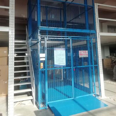 China Vertical Cargo Lift Warehouse Building Material Stores Electric Power Guide Rail Hydraulic Lift Platform for sale