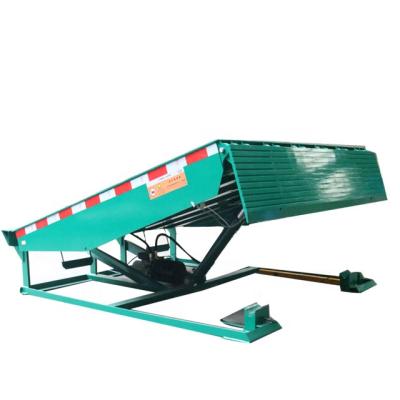 China Automation Equipment Good Quality 12 Ton Container Lift Hydraulic Dock Leveler Adjustable Loading for sale